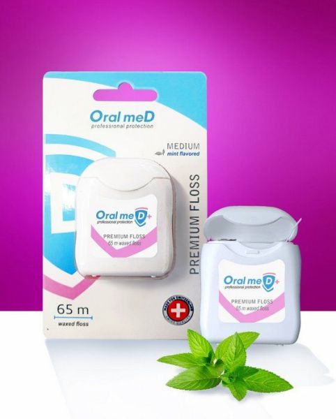 Изображение товара Зубная нить ORAL MED + MEDIUM 65м Зубная нить ORAL MED + MEDIUM 65м фотография